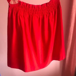 Bright red mini skirt